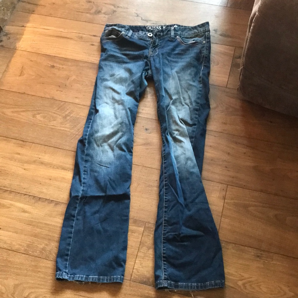 Guess jeans slight distress on back of pant legs